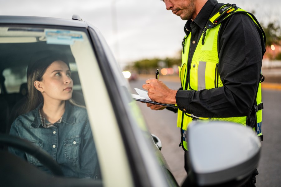 A police officer writing a ticket