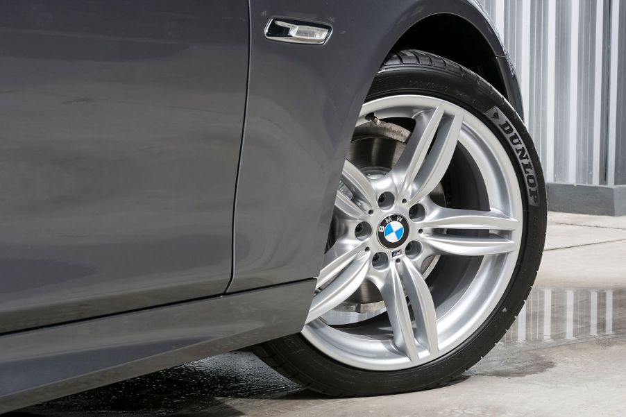 A BMW parked at the curb