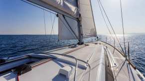 Standing on a sailboat in the ocean