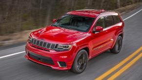A red 2021 Jeep Grand Cherokee Trackhawk
