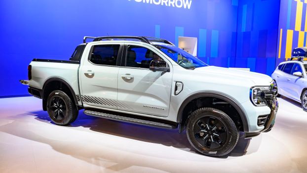 White Ford Ranger PHEV on stage at an auto show.