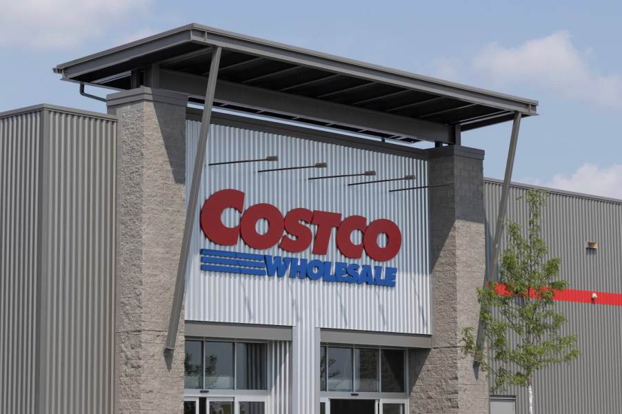 The Costco sign above a store, the front doors visible.
