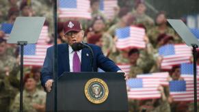 President Donald Trump, pictured here speaking to US Army troops, says he has a deal with China to secure magnets and rare earths.