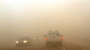 Dust and air quality warnings in three states have drivers off the road