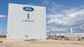 Ford Motor Company logo on the side of a factory building.