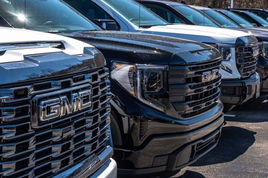 A row of GMC trucks, like the ones included in a recent GM recall for L87 engines.