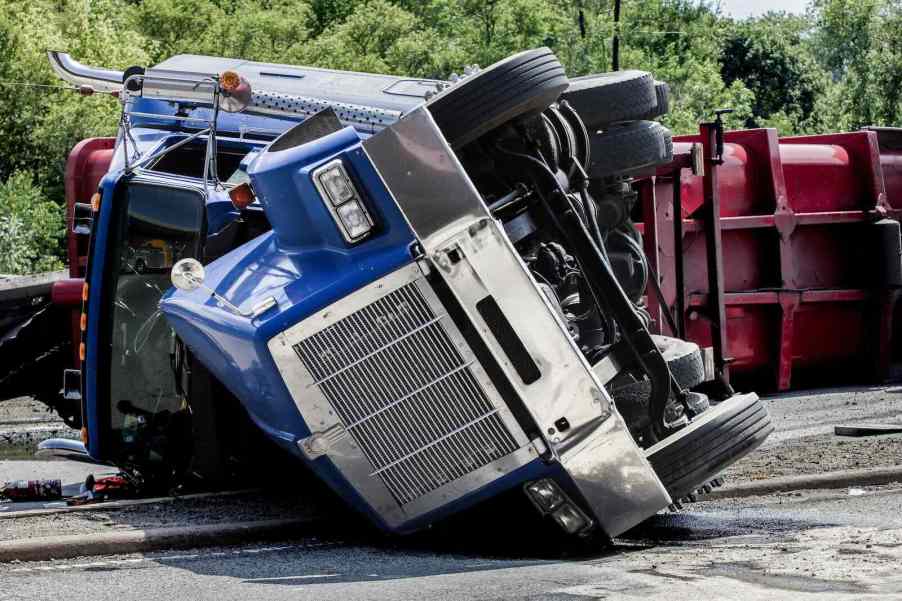 Semi truck rollover crash after florida man jumped from the cab