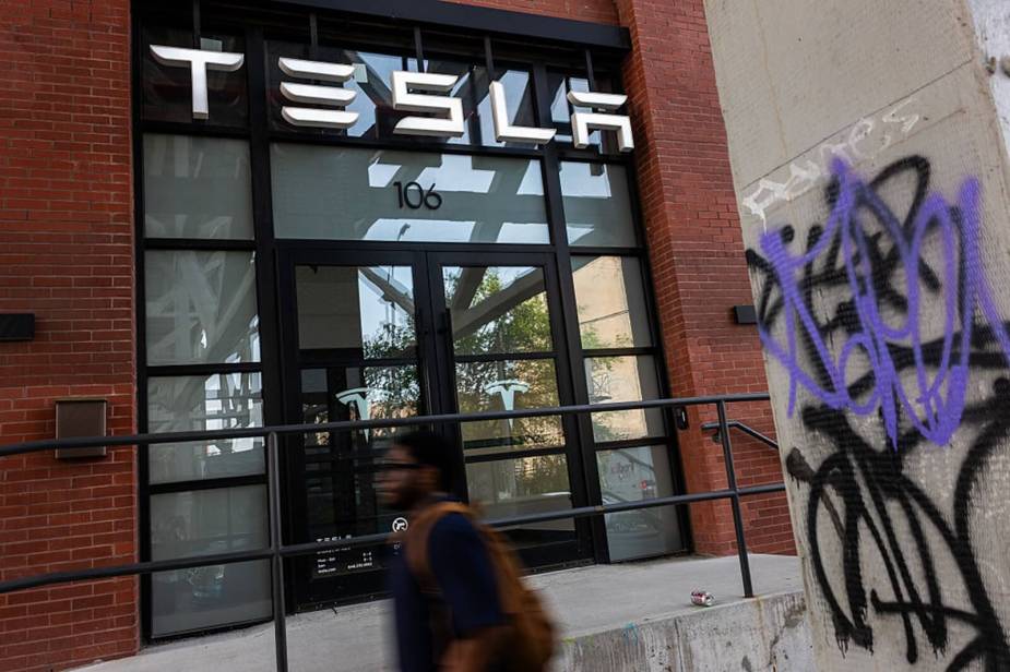A Tesla location with graffiti after demonstrators defaced it.