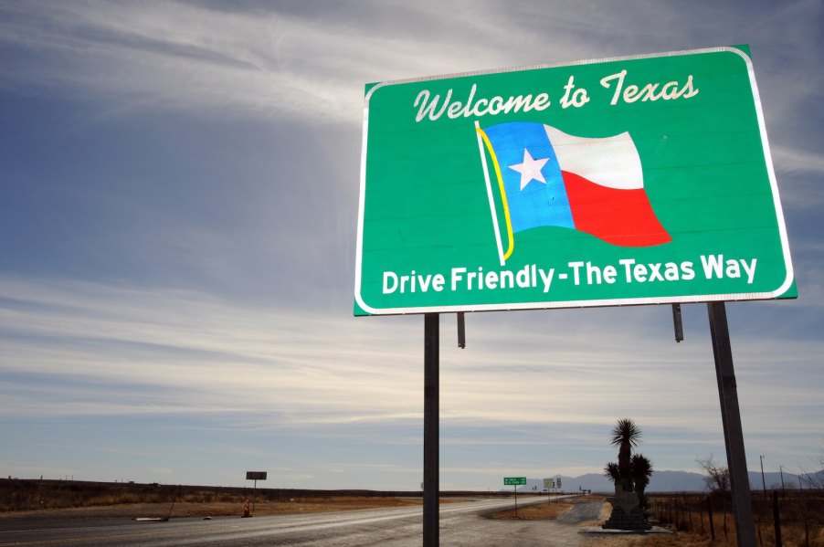 Welcome to Texas sign on the highway.
