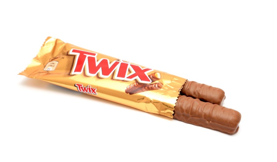 Unwrapped double Twix bar on a white background.