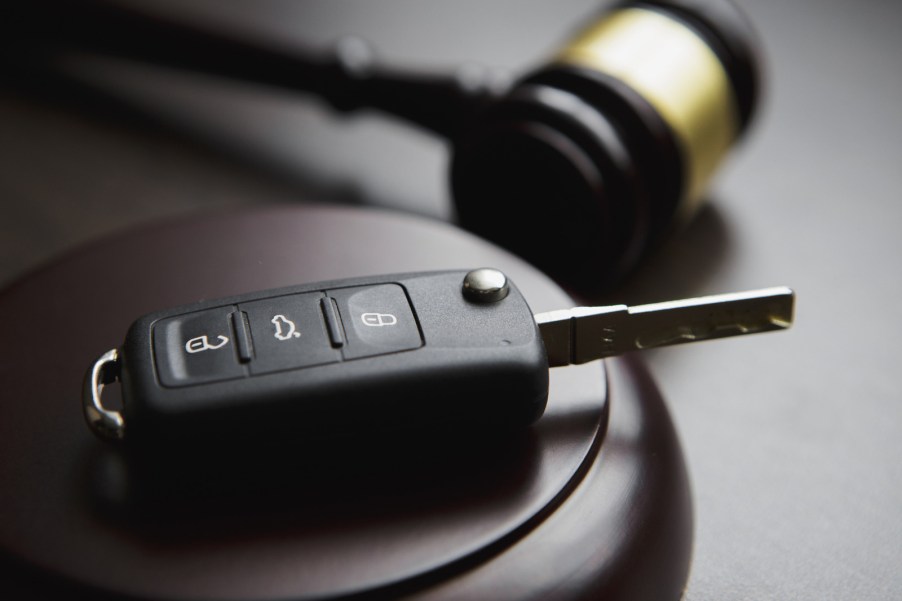 A gavel and car key fob depicting a DUI conviction