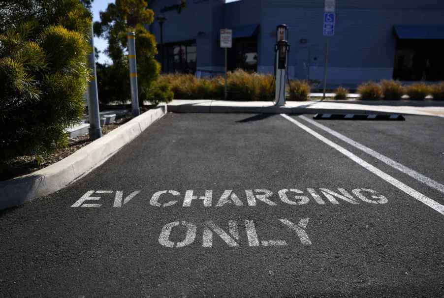 A parking spot labeled "EV charging only" photo taken the day President Trump blocked California's gas car ban