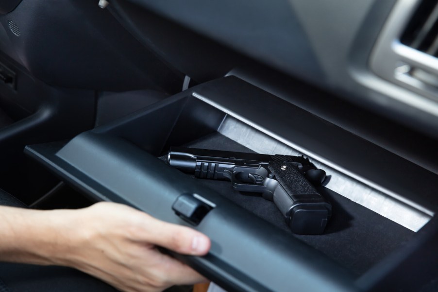 Gun in open car glovebox