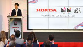 American Honda Motor Co. CEO speaks on stage after the automaker announced its partnership with LA28