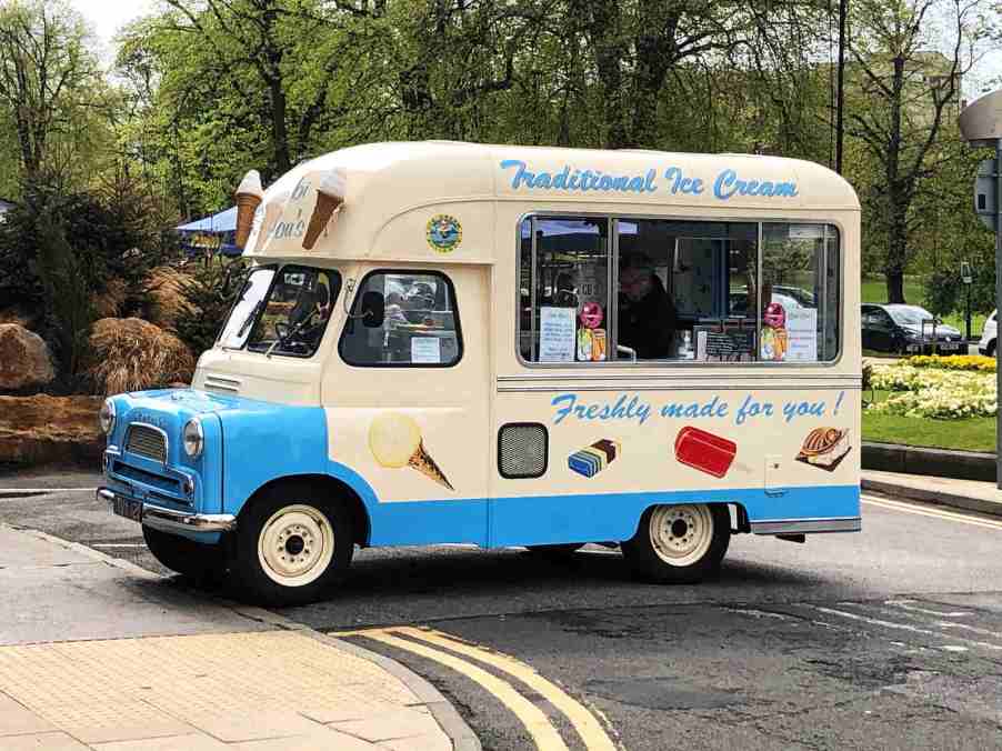 An ice cream truck parked in the United Kingdom.