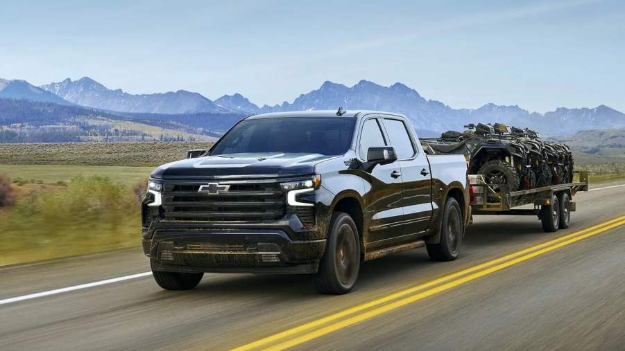 The 2025 Chevy Silverado hauling ATVs