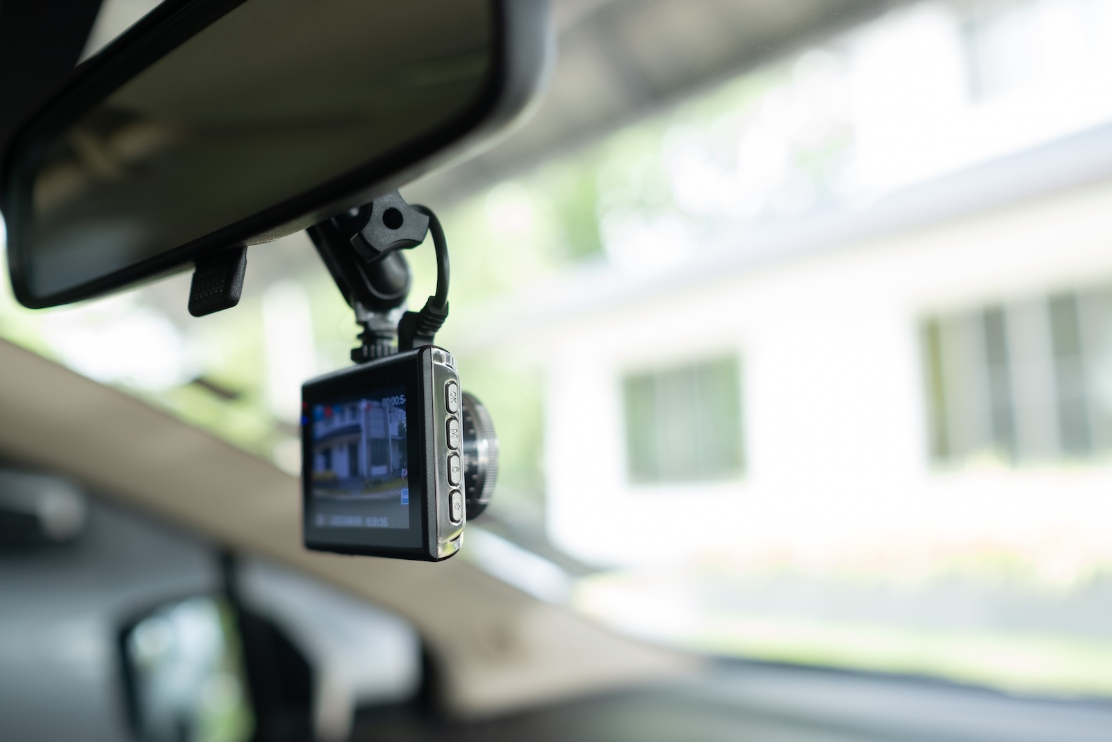 Aftermarket dashcam on Cadillac Lyriq's rearview mirror