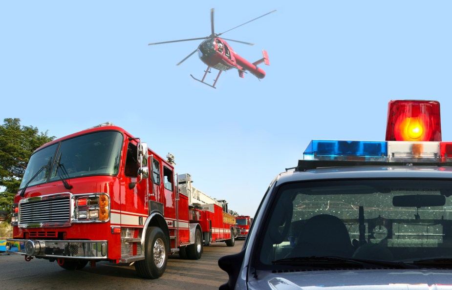 A helicopter above a fire truck