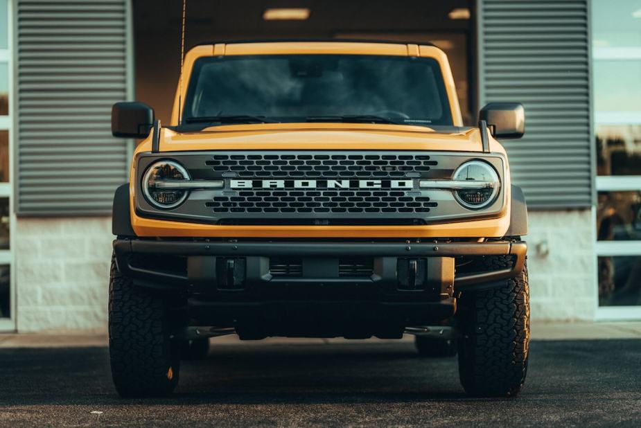 A yellow Ford Bronco shows off its fascia.