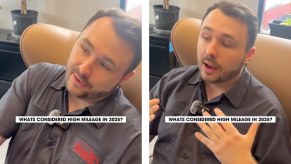 Mechanic sitting at a desk discussed the definition of high mileage cars.