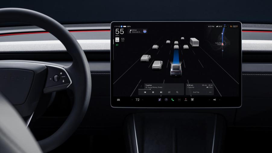 A Tesla shows off its Autopilot self-driving feature.