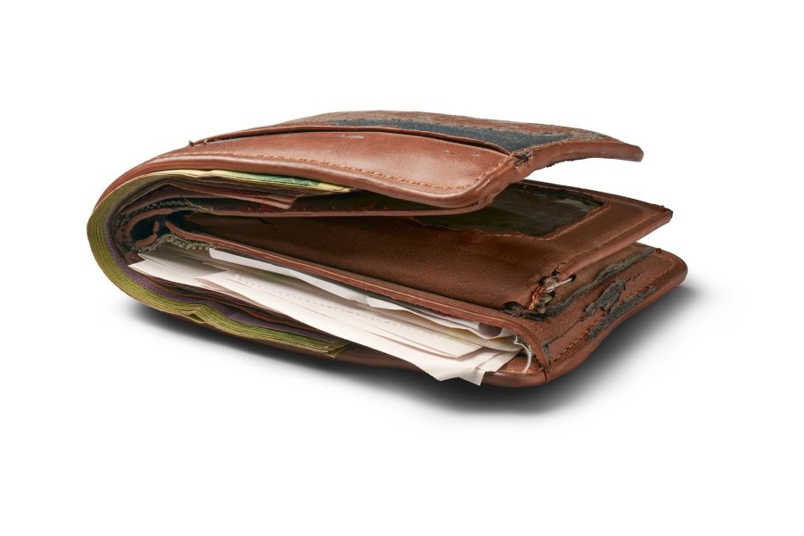 Old brown wallet Ford factory worker left in an Edge crossover found by mechanic