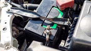 A car battery under the hood