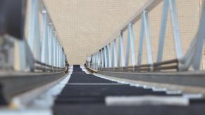 Looking down a tall metal ladder