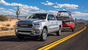 The 2019 Ram 1500 towing a boat