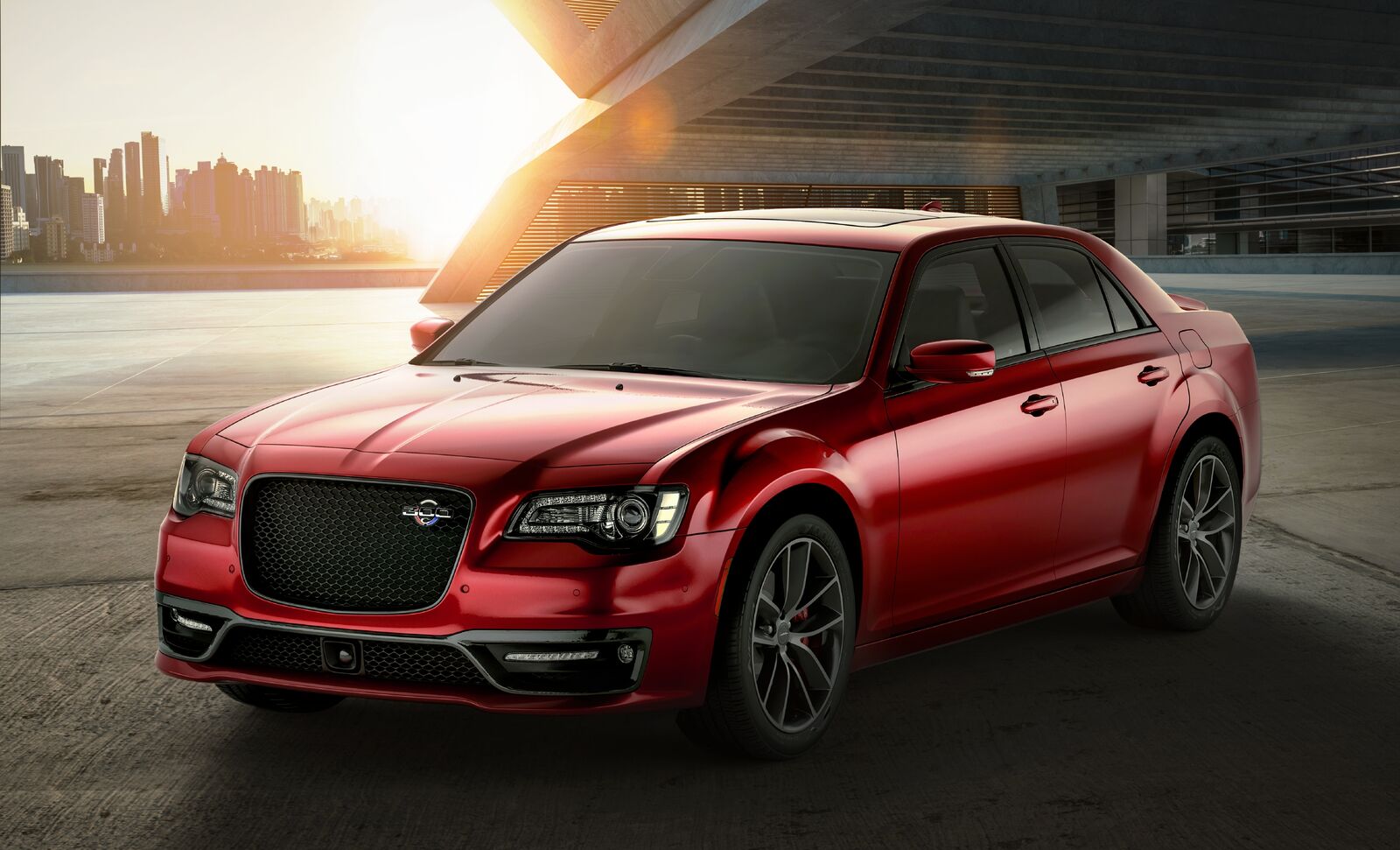 A red 2023 Chrysler 300 sedan parked in left front angle view
