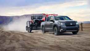 The 2025 Honda Ridgeline pulling a trailer