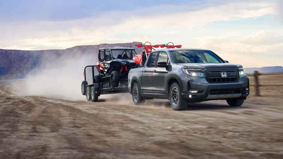 The 2025 Honda Ridgeline pulling a trailer