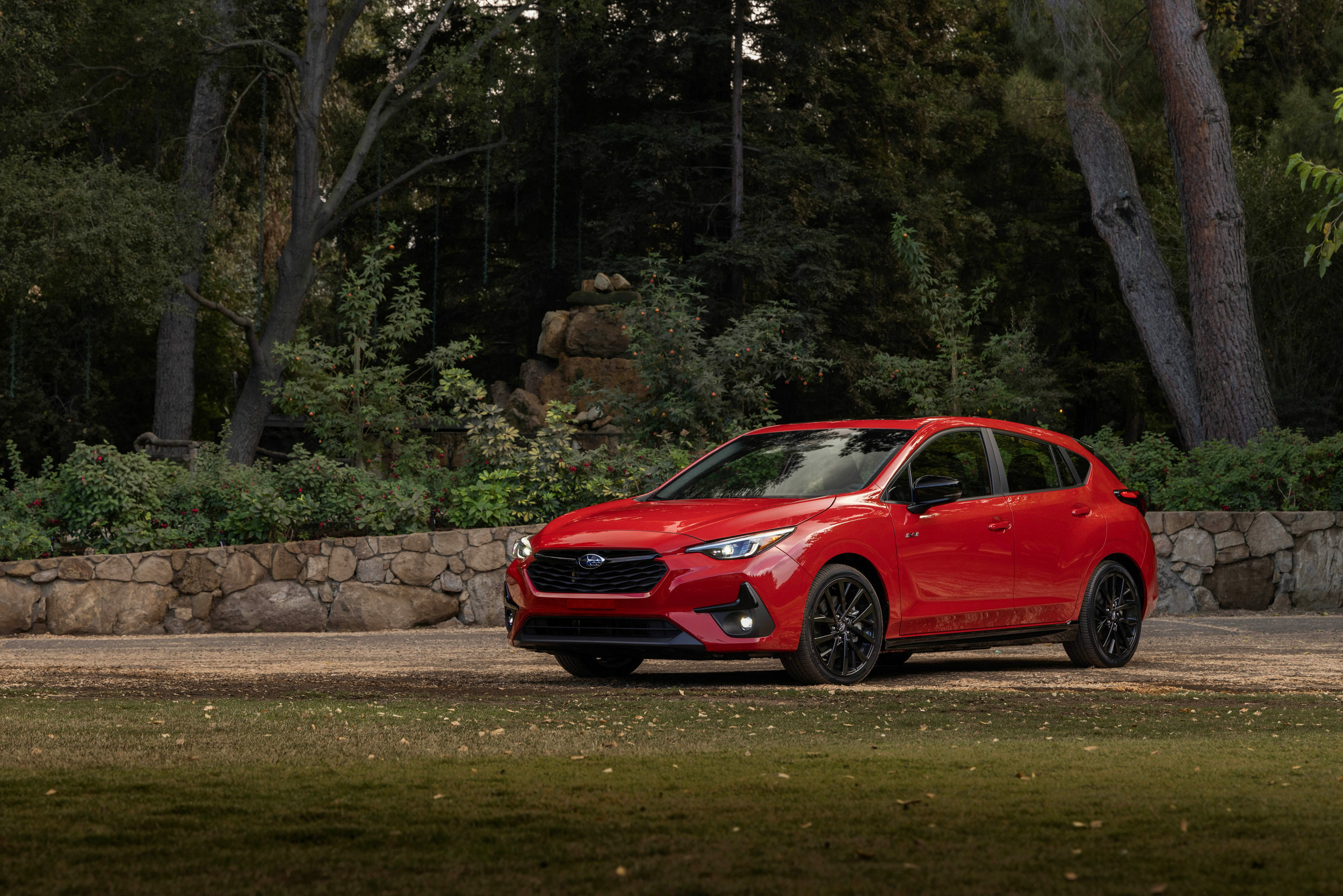 The 2026 Subaru Impreza near foliage