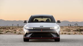 A white 2026 Hyundai Ioniq 5 N parked in the desert in direct front view