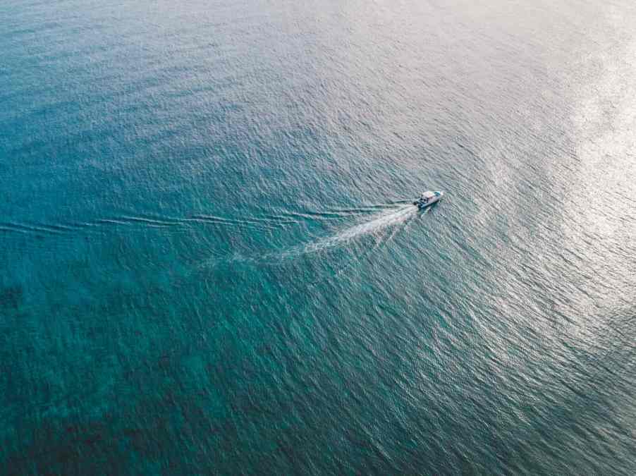 Bird's eye view of Doug and Stephanie Naeher's powerboat in the ocean near Florida