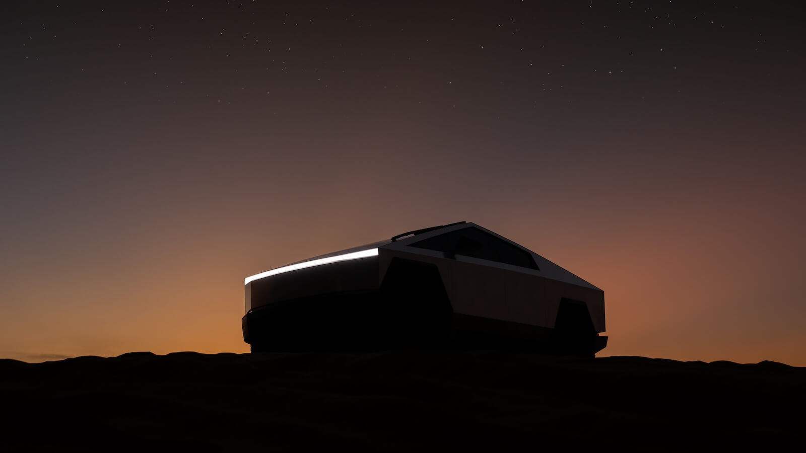 A Tesla Cybertruck with its light bar illuminated at dusk.
