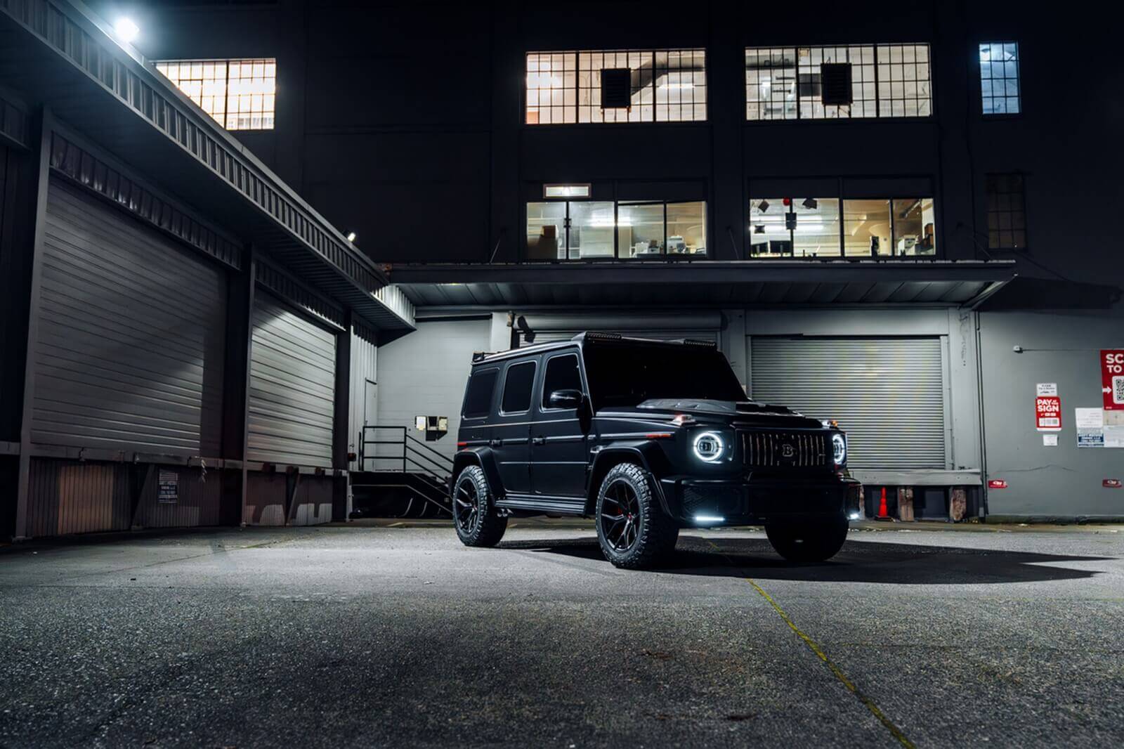 A custom Brabus Mercedes-Benz G-Class in the dark.