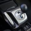 The gearshift lever in an automatic transmission car coasting downhill in neutral