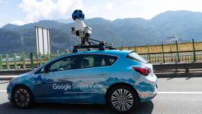 Google Street View car driving along the highway, a camera visible on top.