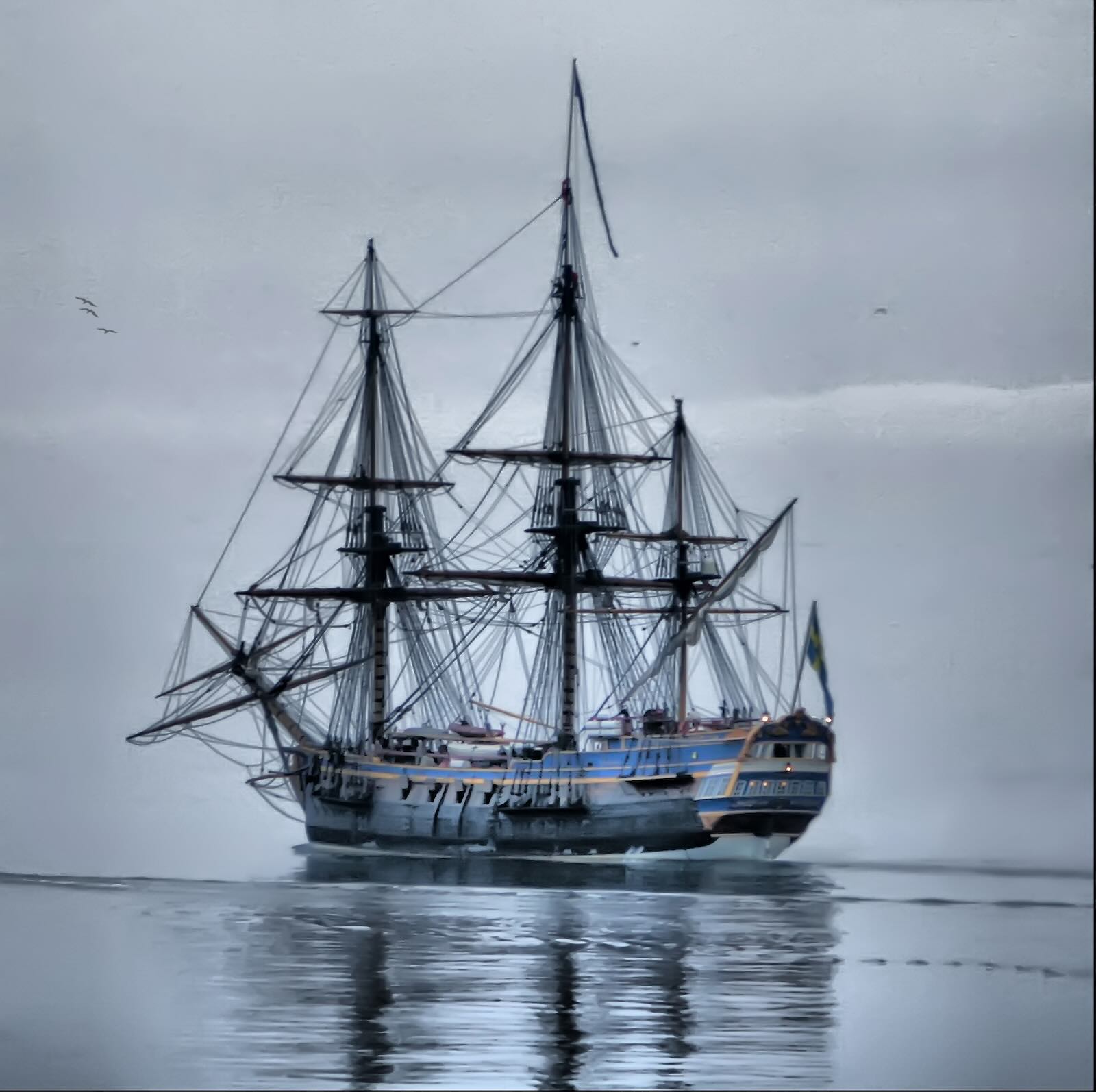 The Götheborg sailing ship on the ocean, fog in the background.