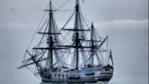 The Götheborg sailing ship on the ocean, fog in the background.