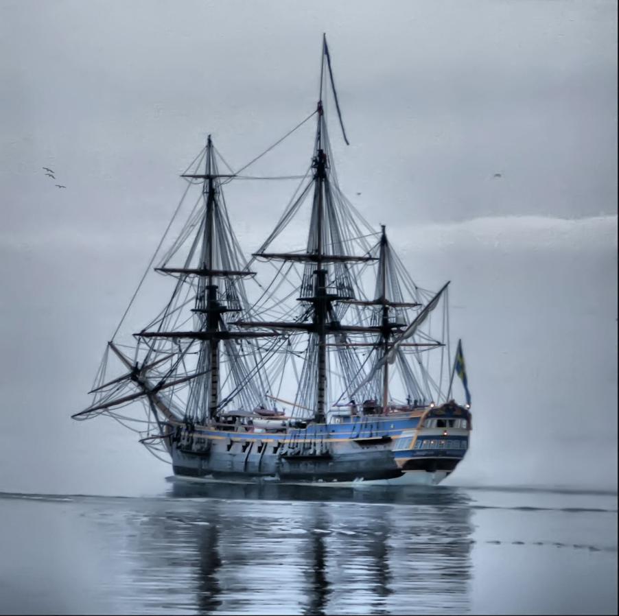 The Götheborg sailing ship on the ocean, fog in the background.