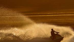 Toronto man races from Ontario Canada to Detroit, Michigan on a jet ski during an illegal sunset border crossing.