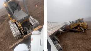 Images of landfill bulldozer blocking semi truck and tipping over its trailer.