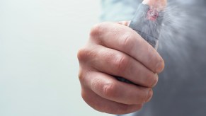 A man using pepper spray