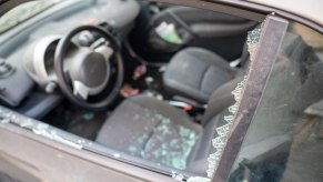 Parked car with broken window.