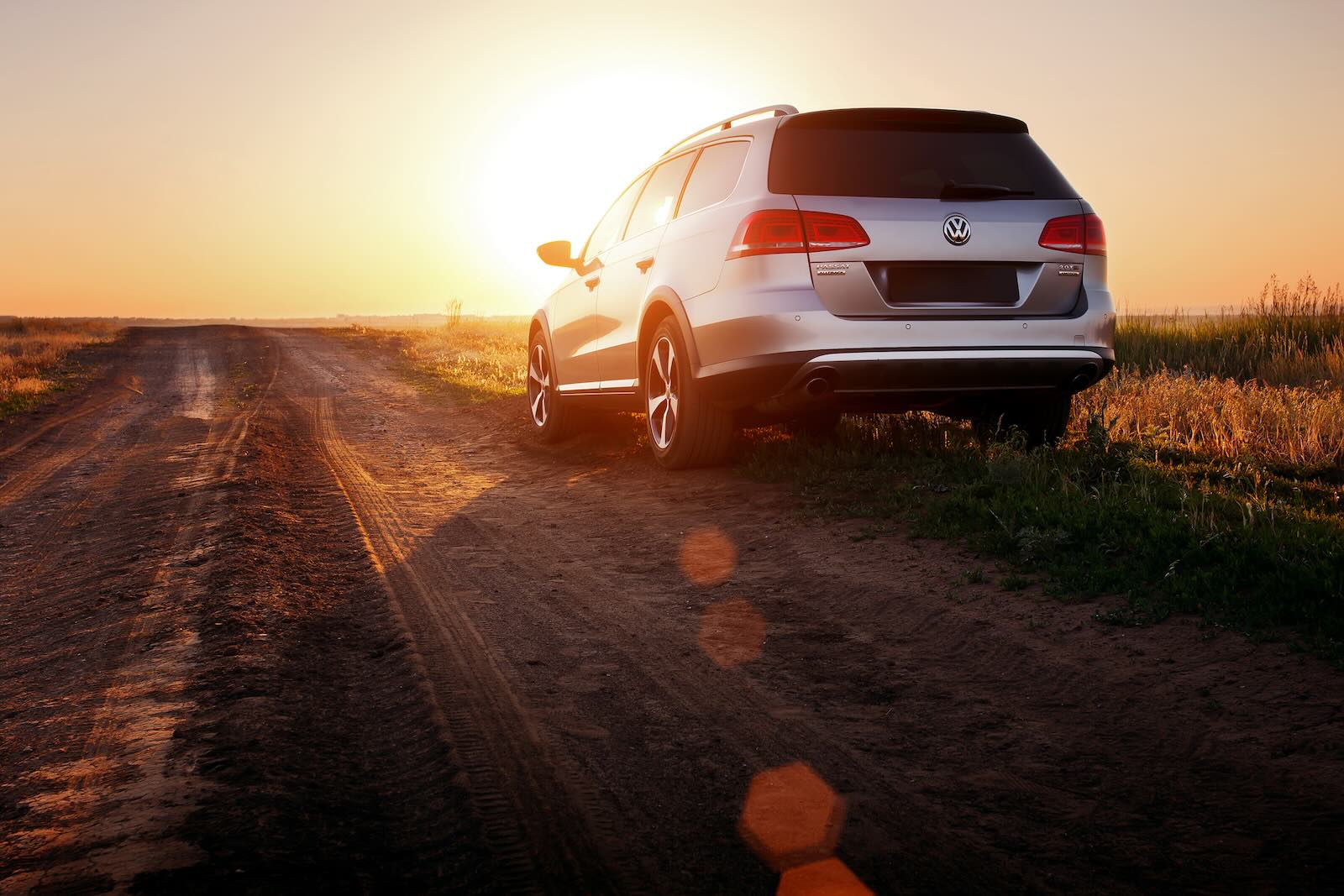 Volkswagen parked in the desert after diesel gate buy back, the sunset in the background.