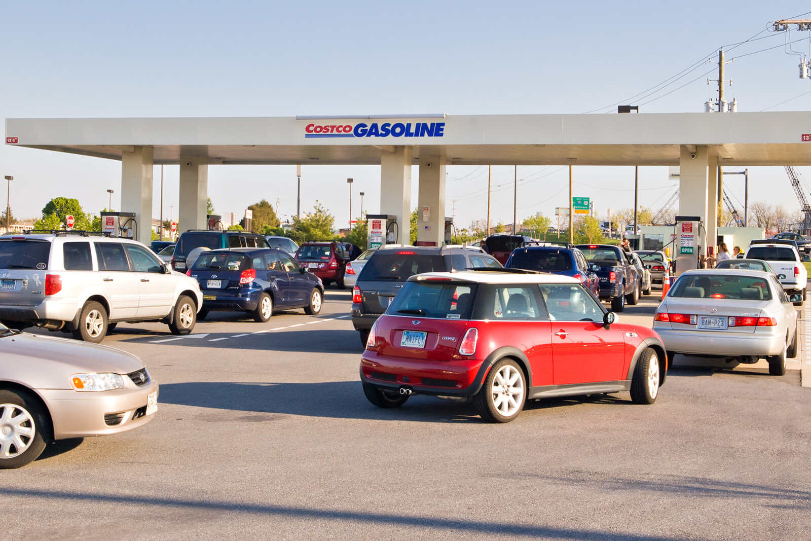 Costco gas station with lines of cars waiting to refuel