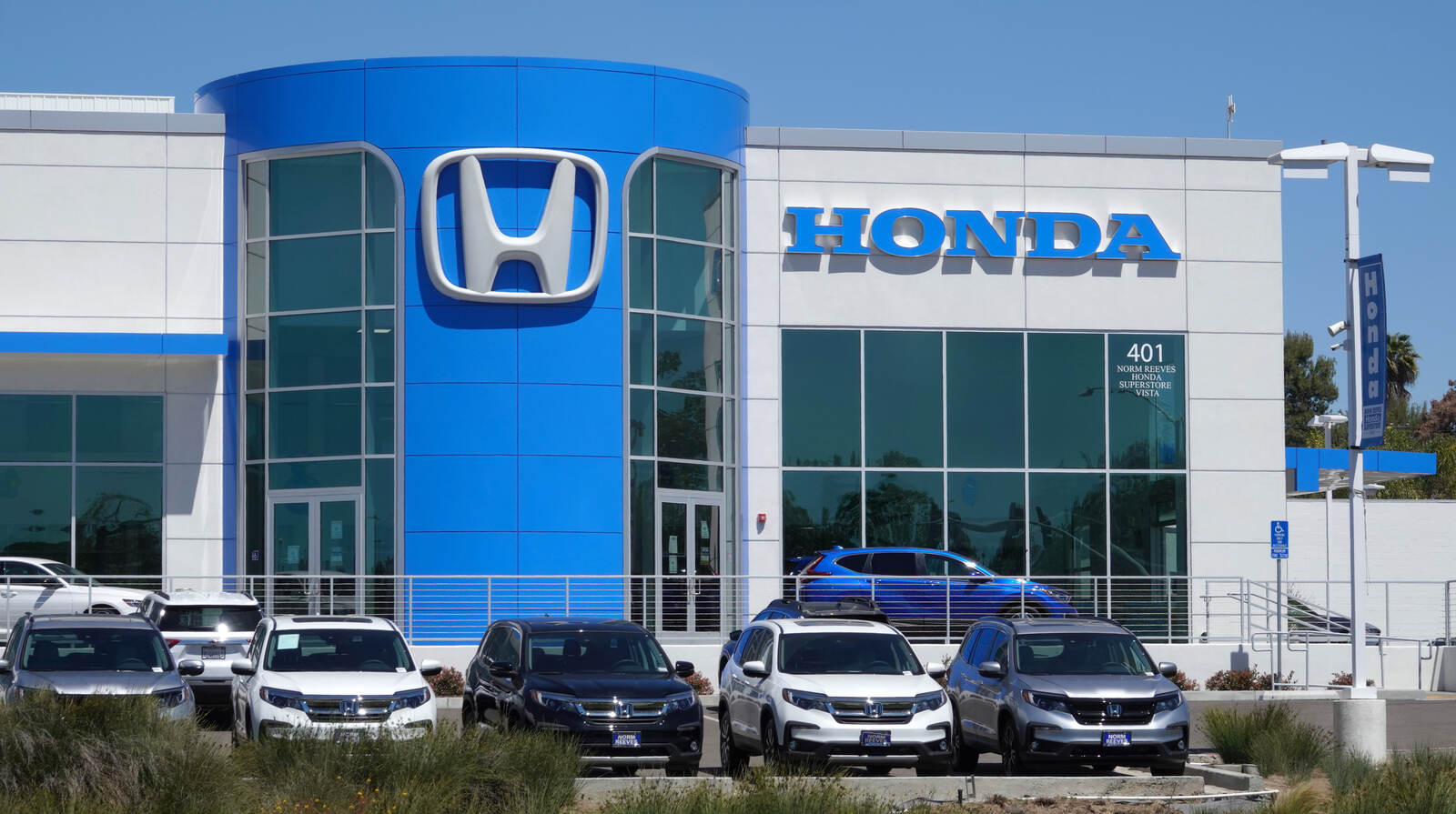 An exterior shot of a Honda dealership