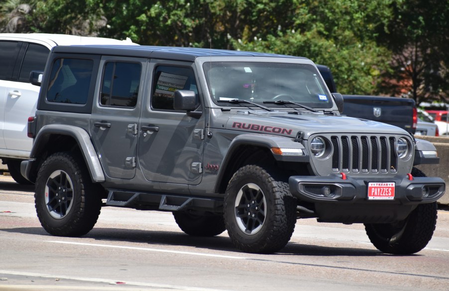 A charcoal Jeep Wrangler Rubicon in right front angle view
